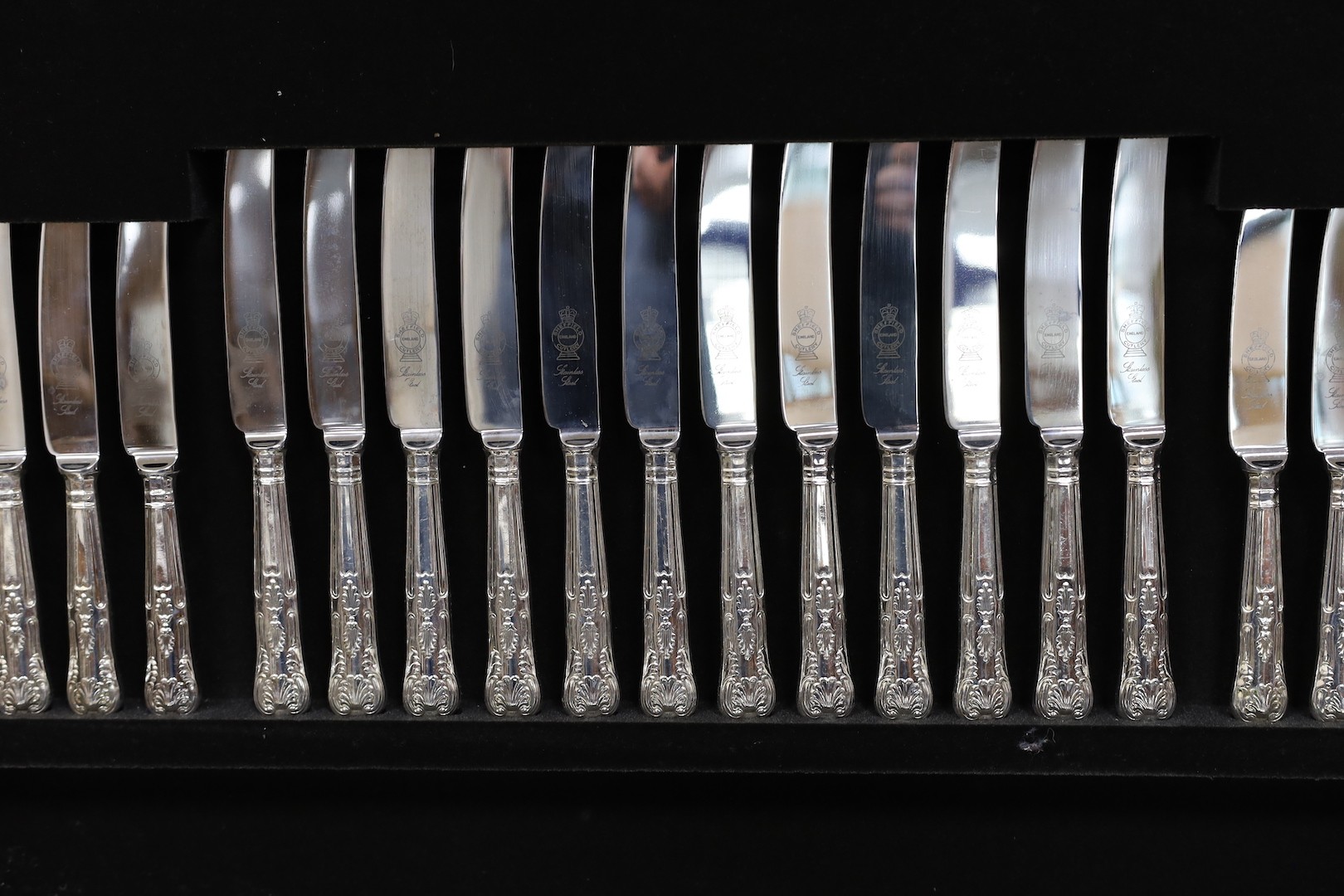 A leather inset canteen of silver plated flatware